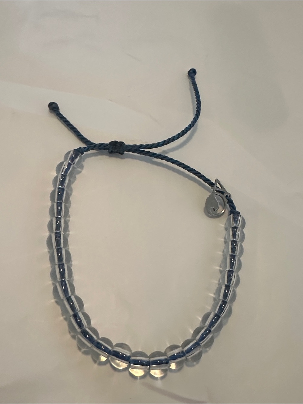 NWOT 4Ocean Clear Beaded Bracelet with Blue Cord